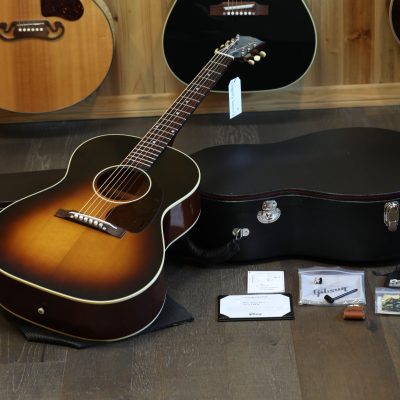Another quality Guitar from Lovies Guitars, please google us for deals and additional photos on our website. Lovies Guitars is excited to present this 2024 Gibson Custom Shop 1942 Banner LG-2 Acoustic Guitar finished in Vintage Sunburst. This exceptional Custom Shop recreation from Gibson faithfully captures the feel, tone, and character of the legendary wartime-era LG-2 models that have become some of the most beloved small-body acoustics ever produced. The 1942 Banner LG-2 is prized for its dry, woody midrange, warm low end, and articulate response. Its smaller body size offers incredible balance and comfort while maintaining impressive projection and tonal richness. Perfect for fingerstyle, blues, folk, Americana, and singer-songwriter applications, this guitar delivers the intimate responsiveness and vintage-inspired voice players seek in a premium small-body acoustic. The Vintage Sunburst finish paired with period-correct Banner styling gives this instrument an authentic pre-war aesthetic with outstanding Gibson Custom Shop craftsmanship throughout. This guitar is all original (OG) and comes complete with its Certificate of Authenticity (COA) and Original Hardshell Case (OHSC). Condition is rated at 9.6/10 – Excellent. There is light finish blushing on the top, while the back and sides remain exceptionally clean. No cracks or repairs. SPECS Model: 2024 Gibson Custom Shop 1942 Banner LG-2 Finish: Vintage Sunburst Body Shape: LG-2 Small Body Top: Thermally Aged Adirondack Spruce Back & Sides: Mahogany Neck: Mahogany Fingerboard: Rosewood Bridge: Rectangular Rosewood Bridge Bracing: Traditional Scalloped X-Bracing Tuners: Open Gear Vintage Style Case: Original Hardshell Case (OHSC) + COA Condition: 9.6/10 – Excellent Lovies Guitars Guarantee A beautifully crafted Gibson Custom Shop Banner LG-2 with vintage-inspired tone, premium materials, and exceptional resonance. Clean, original, and highly responsive—this 1942 reissue is a fantastic modern recreation of one of Gibson’s most iconic small-body acoustics. 1st Fret: .890” 12th Fret: .998” Nut Width: 1 3/4" Serial: 22314041 SKU: 9748 Each guitar comes with a Sample of Fret-Not fret and fingerboard cleaner and our favorite Cooper Pick. We offer a 14-day money-back return policy. Buy with confidence. All guitars are guaranteed to arrive in the condition as described, and a full refund will be issued if not. Additionally, all our guitars are fully insured, and we will assist with any claims that may arise. Lovies Guitars holds a CITES Master File, and we can provide certificates when and where they are required. We are also declaration-friendly, ensuring a smooth experience for international shipments.